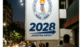PRD billboard reading “2028 ¡NUESTRA META!” on a city street
